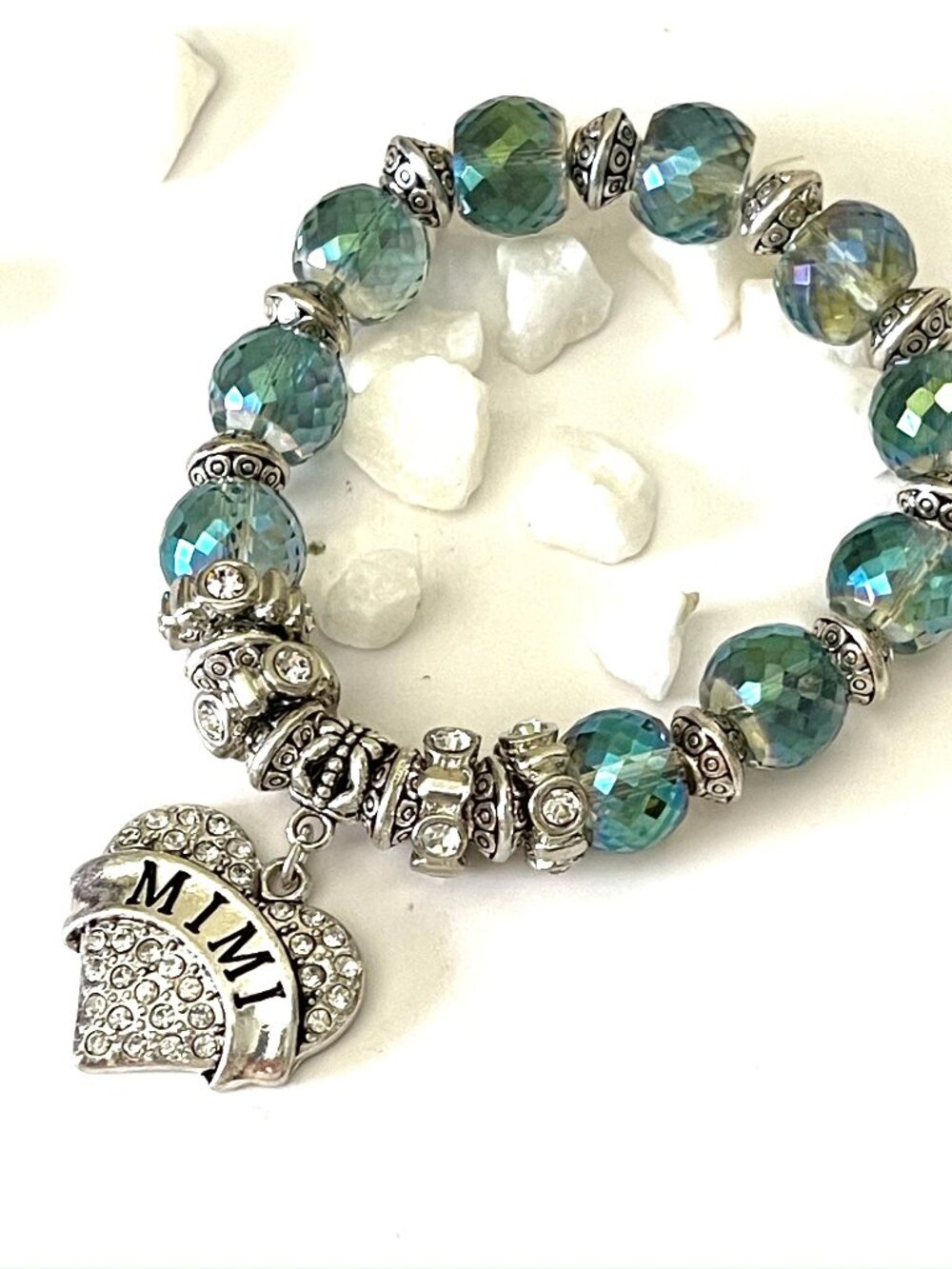 MIMI charm bracelt with diamond glass cut beads Streatchable.